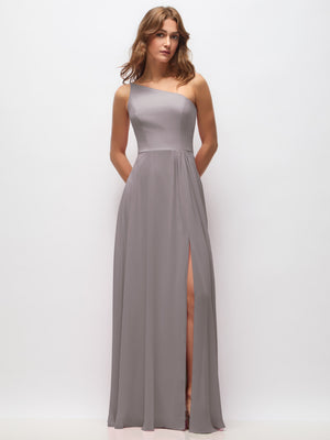 One-shoulder chiffon maxi dress in light gray-lilac, shirred waist, front slit.
