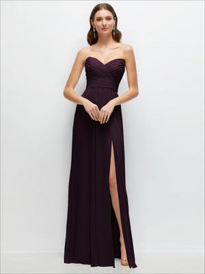 Strapless chiffon maxi dress with ruched bodice and front slit, deep plum color