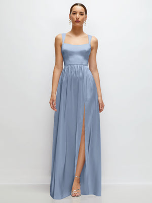 Midnight navy satin maxi dress with portrait neckline, thin straps, gathered waist, front slit