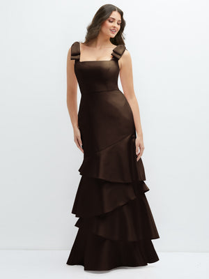 Dark brown satin maxi dress with bow-shoulders and asymmetrical tiered ruffle skirt