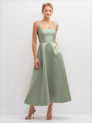 Sage green satin midi dress with thin straps and full skirt, side view