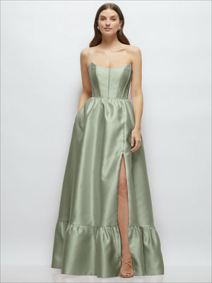 Sage green strapless maxi dress with fitted bodice, side slit, and ruffle hem
