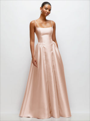 Ivory satin maxi dress with scoop neckline, spaghetti straps, and gathered basque waist