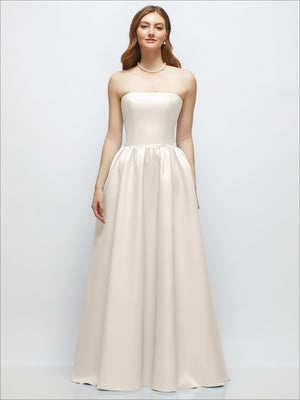 Ivory satin strapless drop-waist gown with full gathered skirt