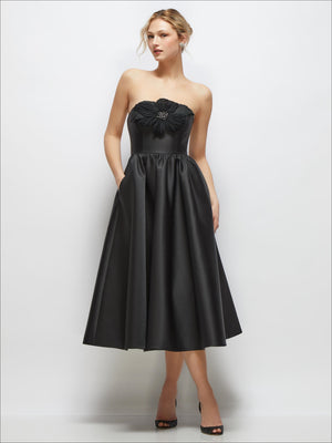 Black strapless satin midi dress with fabric flower bodice and horsehair hem