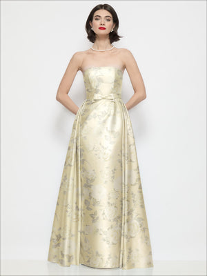 Cream gold floral strapless satin column dress with bow at waist and full skirt