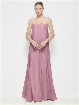 Strapless shirred chiffon maxi dress in soft pink with smooth strapless neckline and gathered waist.