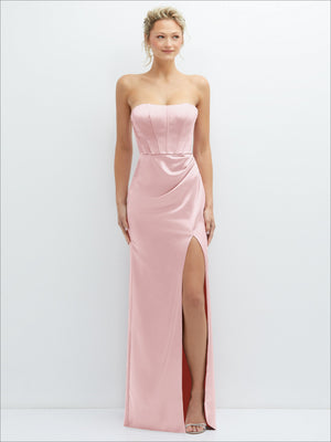 Light pink strapless satin corset maxi dress with draped waist and front thigh slit