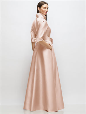 Blush satin shirt dress with 3/4 sleeves, high collar, waist sash, button front, back/side view