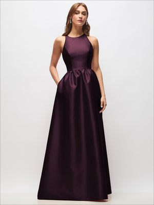 Sleeveless satin maxi dress in dark plum with ruched waist and full skirt.