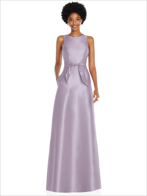 Lilac sleeveless maxi dress with jewel neckline, V-back, and mini sash at waist