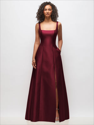 Sleeveless square-neck princess-line gown in burgundy with pockets and side slit.