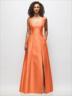 Sleeveless square-neck princess-line gown in coral orange with pockets and side slit.