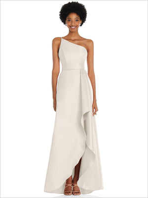 Ivory one-shoulder satin gown with draped front panel and asymmetrical high skirt