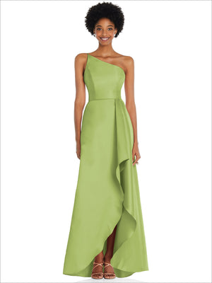 One-shoulder satin gown in light green with draped front slit and asymmetrical hem