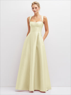 Light yellow satin bustier dress with full skirt and spaghetti straps, front view