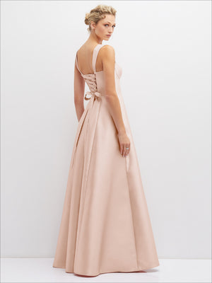 Blush satin bustier dress with lace-up back and bow detail