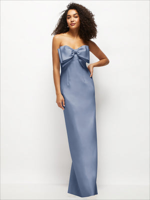 Blue strapless satin column maxi dress with oversized bow at the bust
