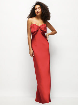 Red strapless satin column maxi dress with oversized bow at neckline