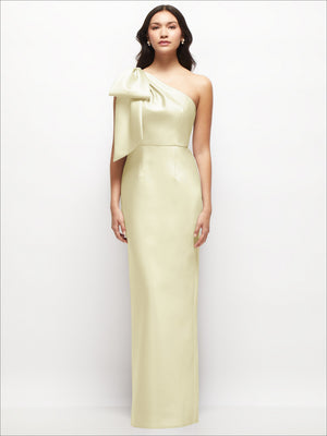 One-shoulder satin column maxi dress with oversized bow, pale cream