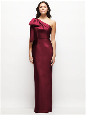 One-shoulder satin column maxi dress with oversized bow, deep plum