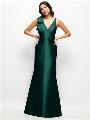 Deep green satin trumpet dress with deep V-neck and one-shoulder bow, front view