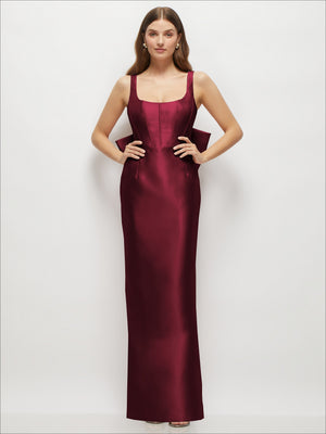Deep plum satin corset maxi dress with scoop neckline and floor-length bow tails