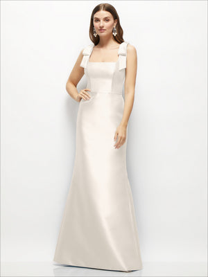 White satin fit-and-flare maxi dress with square neckline and shoulder bow ties