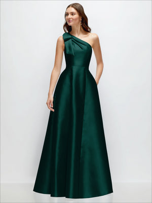 One-shoulder satin maxi dress in deep green with bow detail and full A-line skirt