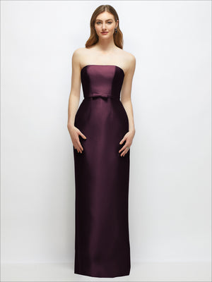 Strapless satin column dress in deep plum with skinny bow belt, front view