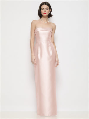 Blush pink strapless satin maxi dress with cuffed neckline and column silhouette.