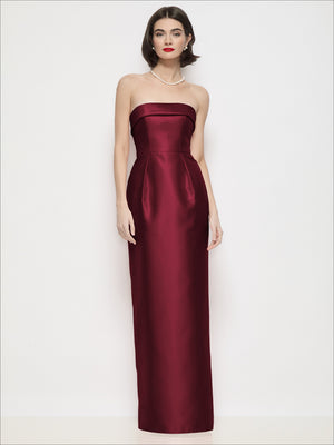 Strapless satin maxi dress in deep burgundy with bandeau neckline, column silhouette.