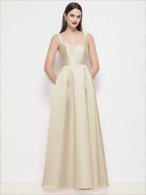 Champagne satin maxi dress with thin straps, square neckline, fitted basque waist, pleated skirt