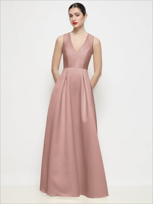 Blush pink sleeveless V-neck satin maxi dress with pleated skirt and gathered waist