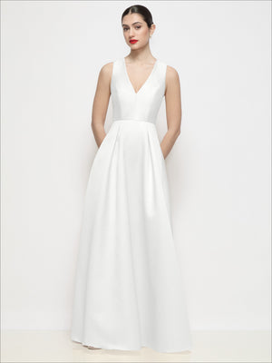 White satin maxi dress with sleeveless V-neck and pleated A-line skirt