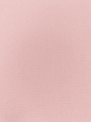 Crepe fabric swatch in blush pink with subtle crinkled texture.