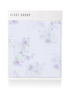Lilac floral tulle fabric swatch with soft pastel flower pattern