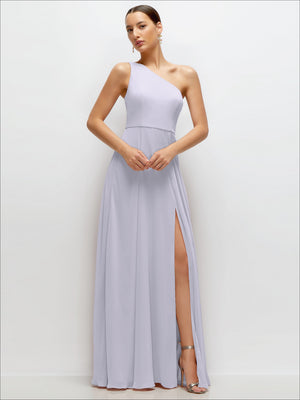Lavender one-shoulder chiffon maxi dress with cinched waist and draped circle skirt, slit hem