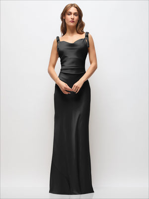 Black satin bias maxi dress with cowl neckline, ruched sides, and shoulder bow straps