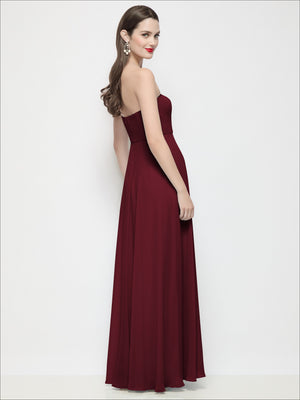 Strapless chiffon maxi dress in deep burgundy, side view, fitted bodice and circle skirt