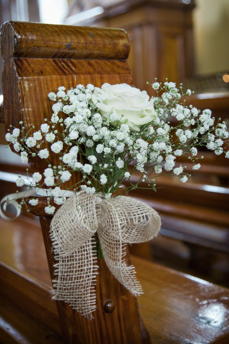 5 easy DIY ideas to decorate your wedding pews | The Dessy Group