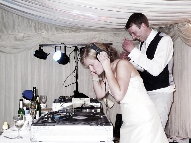 The bride and groom were DJs at their wedding