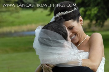 brideandgroomwithveil