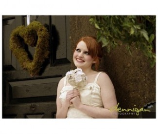 bride by moss heart wreath