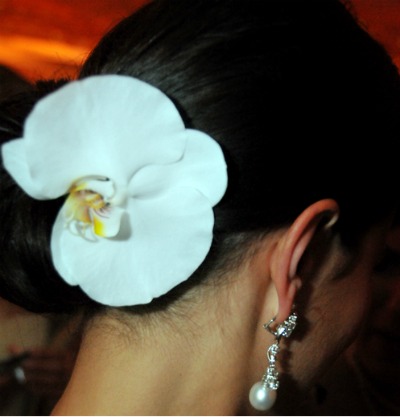 Orchid bloom in hair 