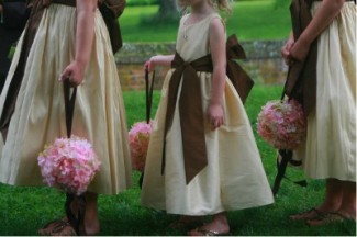 bridesmaids with pink silk hydrangea pompoms