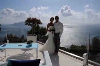 Bride and groom overlooking Capri