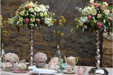 tall candelabra with floral decorations 