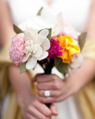 bride holding felt flower wedding bouquet 