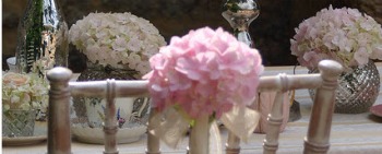 simple pink hydrangea chairback decoration 
